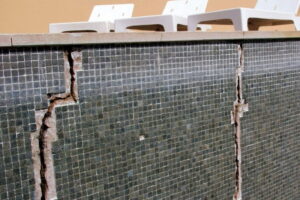 What Causes Pool Cracks in benoni